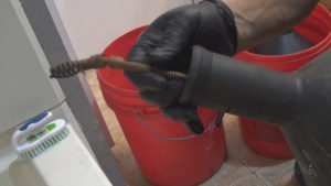 how to clean bathtub drain with a snake