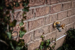 outdoor faucet running and broken